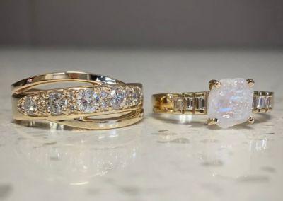 Custom yellow gold ring with oval opal centre stone in Leduc, AB
