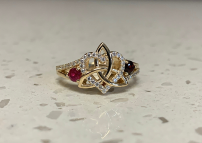 Luxury custom yellow gold ring with ruby and diamond cluster, Leduc, AB